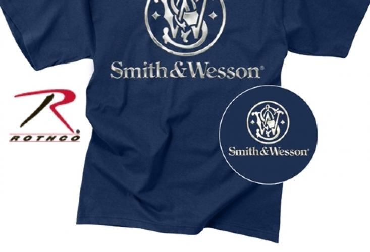 Синяя футболка Smith-And-Wesson  ― настоящий военторг амуниция для экстрима дачи форменную одежду, обувь, головные уборы, снаряжение,  наш военторг станет лучшим местом для совершения покупок. Обратившись к нам, вы получаете выгодные расценки и гарантированно высокое качество продукции.8(495)642-32-56         1734@bk.ru    В нашем каталоге представлены наиболее популярные и пользующиеся большим спросом товарные позиции. Ассортимент в наличии гораздо шире и постоянно пополняется интересными новинками. Всегда в наличии широкий выбор фурнитуры, шевронов, нашивок, знаков; также представлена сувенирная продукция в большом ассортименте. Армейский магазин – широкий выбор военных товаров  Армейский интернет-магазин  Фронт - это широкий выбор товаров военного и тактического направления:      одежды;     снаряжения;     тюнинга на оружие;     различных аксессуаров.  Предлагаемые товары пользуются спросом среди военных и сотрудников силовых структур. Также они популярны среди охотников, туристов и любителей практичной одежды милитари стиля.  Посетив наш магазин военторг в Москве, вы можете быть уверены в качестве и оригинальности изделий. Мы работаем напрямую с известными мировыми брендами военного и тактического снаряжения: Snugpak, ESS, Arktis, Kitanica, Aimpoint, Camelbak, Propper, EBERLESTOCK, CAA, Crye Precision, Outdoor Research и Under Armour. А также с производителями практичной и стильной одежды милитари от Schott Nyc. и Alpha industries. Реализуем армейские товары по выгодным ценам, без посреднических надбавок.  Изучив наш сайт, вы найдёте товары и других популярных брендов военно-тактического направления. Приобрести необходимую одежду и экипировку в Москве вы можете, посетив наши розничные военные магазины. Есть служба курьерской доставки. Наш военторг осуществляет отправку товаров по России. Для этого необходимо оформить заказ на сайте.  Если вы затрудняетесь в выборе - специалисты нашего магазина проконсультируют вас. Многие наши сотрудники увлекаются страйкболом, охотой, туризмом, практической стрельбой. Есть отслужившие в войсках РФ. Мы сами с удовольствием используем военные товары: как одежду, так и снаряжение из нашего магазина. Всегда готовы поделиться личным опытом и помочь хорошим советом. Магазин военных товаров в Москве – идеальный вариант покупки качественных изделий.